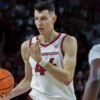 Razorbacks forward Zvonimir Ivisic calls for a teammate during exhibition game with Kansas