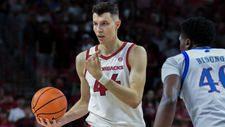 Razorbacks forward Zvonimir Ivisic calls for a teammate during exhibition game with Kansas