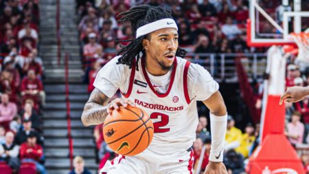 Razorbacks' guard Boogie Fland looking for an opening against Ole Miss