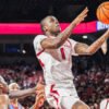 Razorbacks guard Johnell Davis drives for a layup against Ole Miss