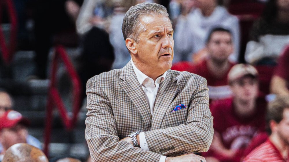 Razorbacks coach John Calipari on the floor against Ole Miss