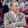 Razorbacks coach John Calipari on the floor against Ole Miss