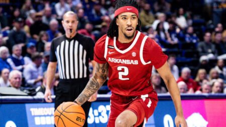 Razorbacks guard Boogie Fland brings the ball upcourt against LSU