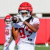 Razorbacks wide receiver Dazmine James makes a catch during one of first fall practices