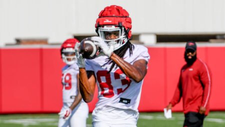 Razorbacks wide receiver Dazmine James makes a catch during one of first fall practices