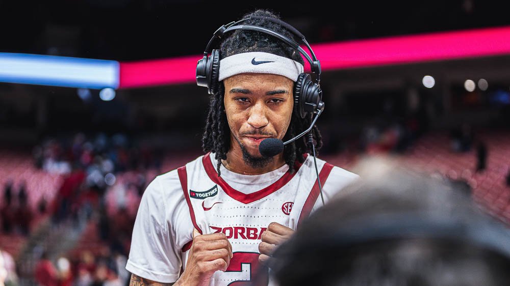 Razorbacks point guard Boogie Fland on a television interview after a win over Oakland