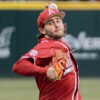 Razorbacks pitcher Zach Root throws against Washington State