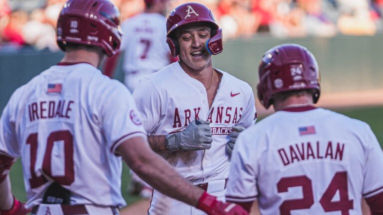 Razorbacks designated hitter Kuhio Aloy comes to the plate after home run against Central Arkansas