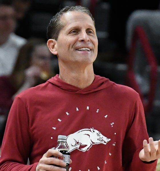 Razorbacks coach Eric Musselman on the sidelines in a game against UNC-Wilmington